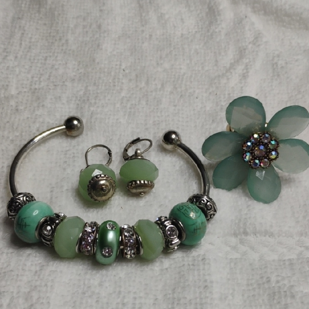 Silver and Green Beaded Bracelet Earrings And Ring With Intricate Detailing